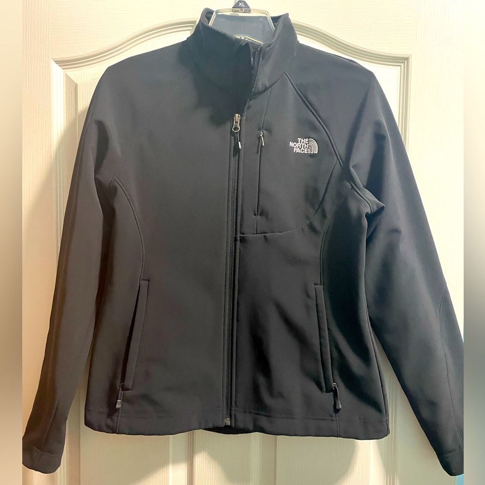 North Face women’s jacket. No hood, water resistant Goretex, size M in black